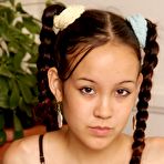 Pic of Adorable girl Amai Liv takes off sensual lingerie before toying her tight slit