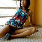 Pic of Skinny Asian gril drops her drawers to expose a meaty and hairy twat
