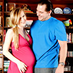 Pic of Amateur pregnant chick Amanda Bryant pulling down her panties