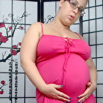 Pic of Curvylicious pregnant slut Georgia Peach poses for her horny fans