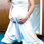 Pic of Amateur pregger Rosanna shows off her belly bump and swollen breasts