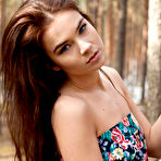 Pic of Beautiful teen Lachia A with small boobs spreading legs naked in the woods