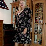 Pic of Fat grandmother with blonde hair exposes herself in tan nylons and garters