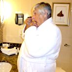 Pic of Fat nan Grandma Libby removes a bathrobe to pose nude in a cupless bra