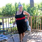 Pic of Amateur grandmother Girdle Goddess smokes before getting naked in nylons