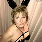 Pic of Mature woman Busty Bliss models cosplay attire prior to a POV blowjob