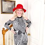 Pic of Chunky granny Judy Belkins revealing shaved pussy and large boobs