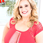 Pic of Overweight blonde Cami Cooper takes on two dicks at once in a revealing dress