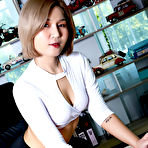 Pic of Hot Asian secretary Nyla dildos her bush at work in high-heeled shoes