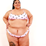 Pic of SSBBW Crystal Blue removes a bra and panty set to pose naked in shoes