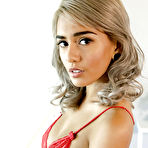 Pic of Janice Griffith criss-crosses her long legs and squeezes her melons