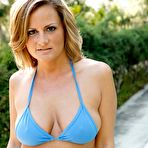 Pic of Stunning MILF Becca Blossoms stripping off her bikini by the pool