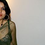 Pic of Indian MILF Kavya Sharma does away with her clothing to go nude on a couch