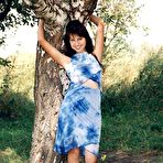 Pic of Pretty Indian girl strips to a thong and heels against a tree
