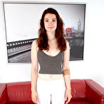 Pic of Pretty teen Flora slips her yoga pant down to flash her hairy muff