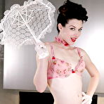 Pic of Stoya is exposing her small ass and tiny tits in erotic pink lingerie