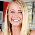 Pic of Cute teen girl Casi James does a bit of a striptease to pose in the nude