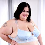 Pic of Brunette SSBBW Natalie Kinky takes off her lingerie while wearing heels