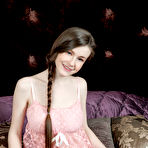 Pic of Charming teen Emily Bloom snacks on fruit while showing her tasty pussy