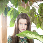 Pic of Beautiful young girl Emily Bloom posing in knee socks for glamour shoot