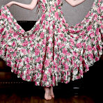 Pic of Russian solo girl Emily Bloom frees her shaved vagina from her long dress