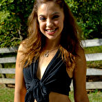 Pic of Latina teenager Gigi Rivera goes topless while firing off a rifle in woods