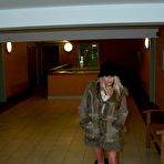 Pic of Blonde cougar Kaz B gives a young man oral sex in a short skirt