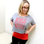 Pic of Overweight blonde Dee Siren gives a BJ before masturbating in a dressing room