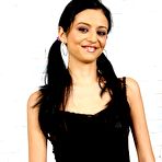 Pic of Thin female Marissa Mendoza wears her hair in pigtails while giving a handjob