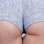 Pic of MILF Sheena Ryder flaunting big butt and hairy twat in long socks