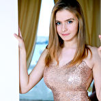 Pic of Young beauty Dakota Pink slips out of an evening gown to pose in the nude