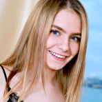 Pic of Beautiful blonde teen Dakota Pink discards a little black dress to pose nude
