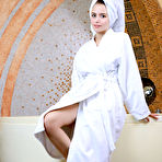 Pic of Teen model Dakota Pink removes a robe and bath towel to pose in the nude