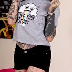Pic of Tattooed cutie Refen takes her shoes off to wiggle her sexy feet at the camera