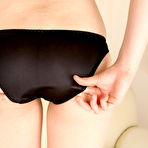 Pic of Redheaded Japanese girl Maiko Saegimi frees her bare ass from polkadot panties