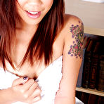 Pic of Tattooed Asian amateur Minnie loves playing with her tight vagina
