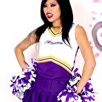 Pic of Asian cheerleader Krissie Dee works free of her uniform in running shoes