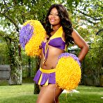 Pic of Ebony cheerleader Monique Symone shakes her pom-poms while exposing herself