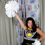 Pic of Asian amateur strips off cheerleader uniform before spreading pussy lips
