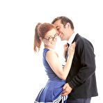 Pic of Cute redhead cheerleader Penny Pax in glasses baring big tits & firm ass