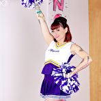 Pic of Tattooed cheerleader Veronica Layke offers up naked pussy on her knees