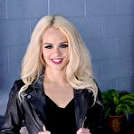 Pic of Cute blonde Elsa Jean slides shorts and panties over nice ass while undressing