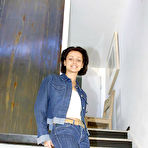 Pic of Big tit brunette in jeans Mona undressing and spreading pussy