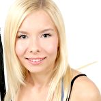 Pic of Skinny blonde teen Dolce fingers and toys her bald pussy after disrobing