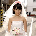 Pic of Beautiful Japanese bride Ruri Narumiya poses on the street during her big day