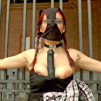 Pic of Submissive redhead is forced into being humiliated in public places