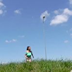 Pic of Solo girl Antonia Sainz takes a piss on a grassy knoll while all alone