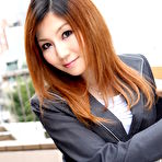 Pic of Attractive Japanese MILF Yuria Kanno posing in public in her sexy uniform