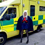 Pic of Older blonde nurse Barby Slut gives a blowjob inside an ambulance