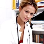 Pic of Solo girl removes her lab coat to model naked other than a stethoscope